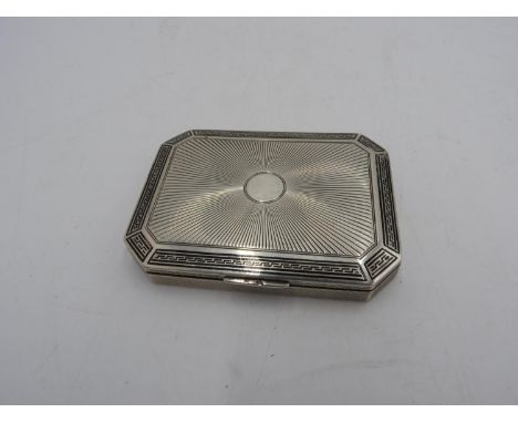 CONTINENTAL ART DECO SILVER AND ENAMEL COMPACT CIRCA 1930 of canted rectangular form 9cm wide 3.9 troy oz. 123 grams 