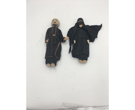 A HANDMADE PAIR OF VINTAGE DOLLS IN EASTERN CLOTHING 28cm high 