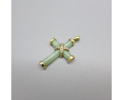 A 9ct gold, jade and diamond cross pendant, 23mm x 31mm 