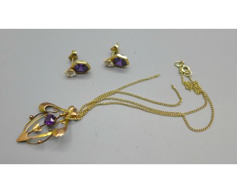 A 9ct gold Art Nouveau pendant and a 9ct gold chain, pendant a/f, and a pair of earrings 
