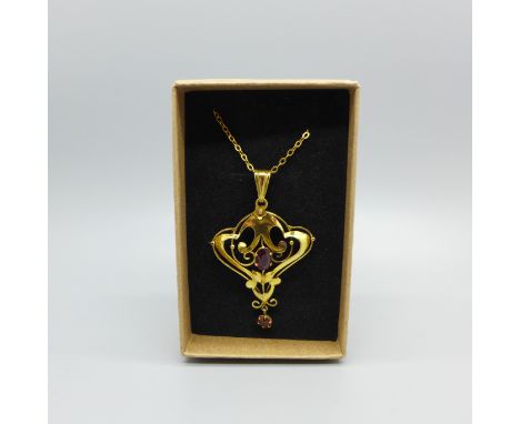 A 9ct gold Art Nouveau pendant and chain, 3.1g 