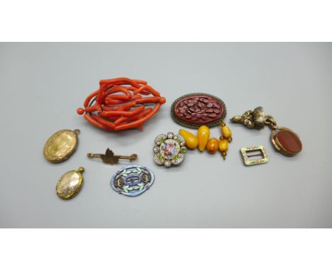 A coral brooch, cinnabar brooch, small enamel buckle, locket, two fobs, butterscotch amber, etc., micro-mosaic brooch lacking