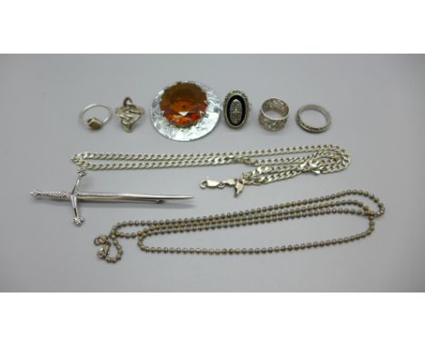 Jewellery including a silver neck chain and five rings 