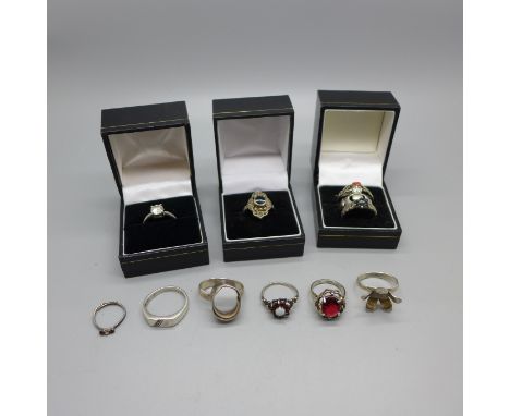 A hallmarked Irish silver Claddah ring, a silver, garnet and opal ring and nine other rings, five a/f 