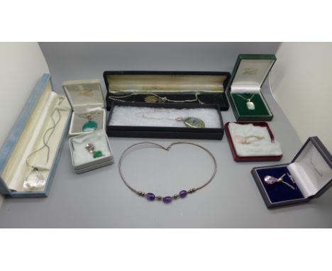 Nine silver and gemstone set pendants and chains 
