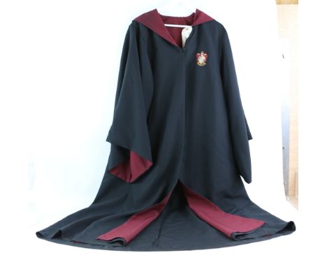Harry Potter - Production made hooded student robe for the Gryffindor house in the film, with house patch..         