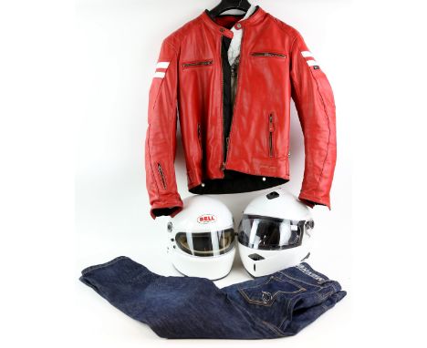 Motorbike gear including two helmets, one by Bell, Rokker jeans in wooden box (W 30 L 32), and a red leather Segura jacket (S