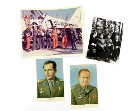 Autographs - Three signed photos of Russian Cosmonauts and a signed 10 x 8 print. .         
