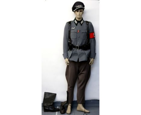 German military costume comprising of jacket, trousers, boots and cap. This costume would have been used in various films and