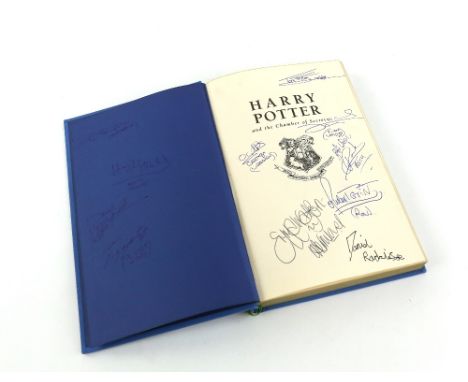 Harry Potter and the Chamber of Secrets - Deluxe first edition hardback book, signed to inside pages by 28 members of the cas