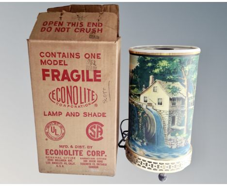 A mid-century Econolite corporation motion lamp with original box.