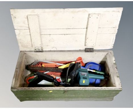 A vintage pine crate containing Black &amp; Decker hedge trimmer with lead, garden spray attachment  