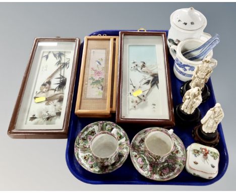 A tray containing Oriental wares including a pair of Cantonese eggshell teacups with saucers, carved resin figures, Chinese e