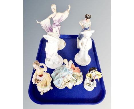 A tray containing assorted figurines including Edward and Elizabeth by Spode, continental figurines, a Capodimonte figure, Li