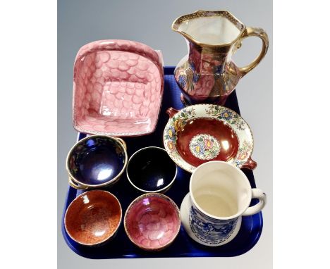 A tray containing eight pieces of Maling ceramics including Poor Richard Way To Wealth jug, Birds of Paradise vase, finger bo