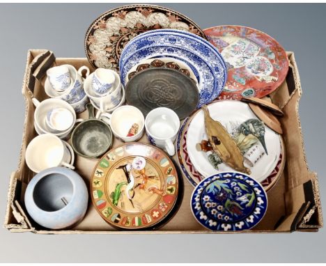 A box containing assorted ceramics Wade whimsies, Venetian glass animal figures, wall plates etc.