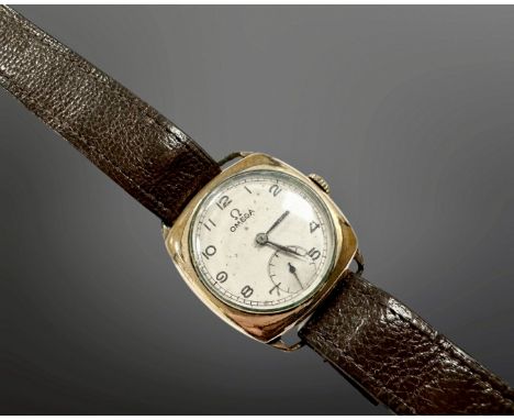 An early 20th century rolled gold Omega Gentleman's wristwatch, the movement numbered 9867103, in Dennison case.