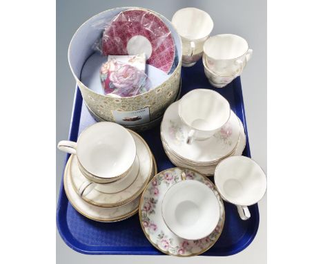 A tray containing teacups and saucers including boxed Wedgwood tea garden cup and saucer, a pair of Royal Doulton Naples trio