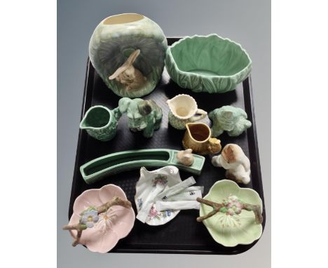 A tray containing Sylvac dog figures, miniature jugs, vases, two Sylvac china baskets and an Aynsley shell dish.