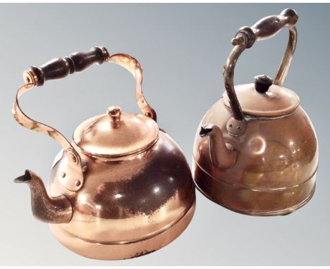 Two vintage copper kettles.