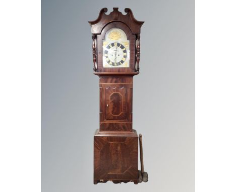 A 19th century mahogany longcase clock with painted dial, pendulum and weights 