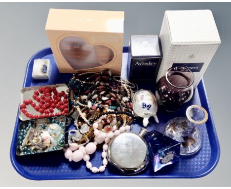A tray containing costume jewellery, Caithness desk clock, Aynsley china tortoise, a Lancome gift set.