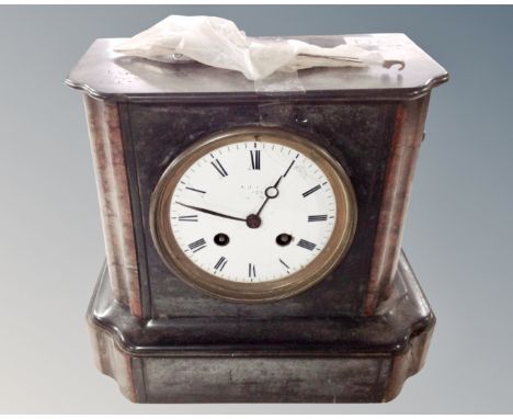 A 19th century black slate and marble mantel clock with enamelled dial. CONDITION REPORT: Glass missing.