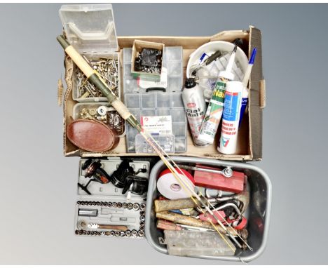 A box containing plastic storage boxes and organizers containing socket set pieces, screws, bolts, hand tools, a two piece fi