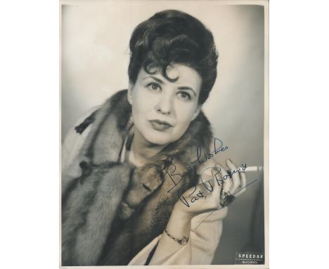 Pat Phoenix signed 10x8 inch black and white vintage photo. Good condition. All autographs come with a Certificate of Authent