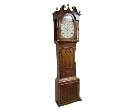 A mid-19th century oak and mahogany longcase clock by “ Wm Harrison, Tadcaster”, swans neck pediment with brass paterae and t