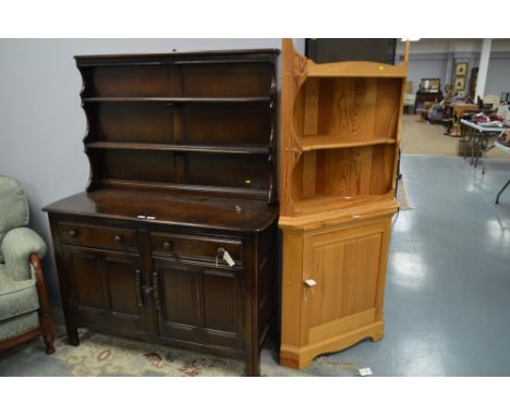 A modern wall hanging corner shelf unit; and matching floor standing pine corner cupboard; together with an Ercol elm dresser