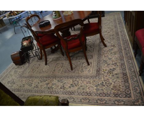 A 20th century flat woven carpet, with cream ground and central floral medallion enclosed by stylised flower borders. 362 x 2