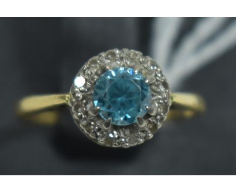 Zircon and diamond cluster ring, on 18ct gold shank, ring size K.