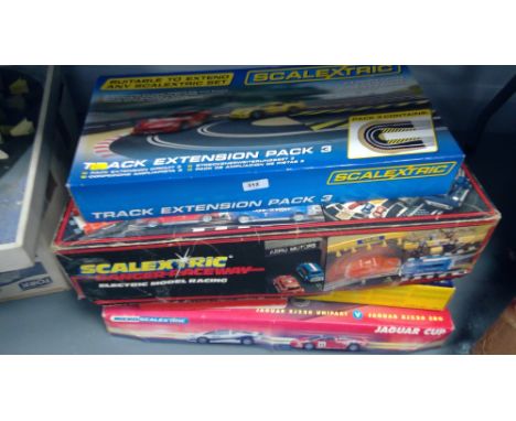 Scalextic sets, to include: Formula One; Jaguar Cup; Mini stock cars; track extensions; and others.