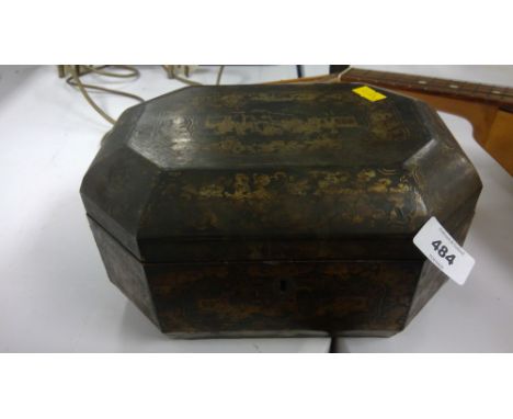 A 19th Century Chinese lacquer tea caddy decorated with gilt painted design, with both metal liners present.