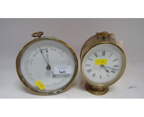 A French brass desk clock c1876; together with a brass barometer.