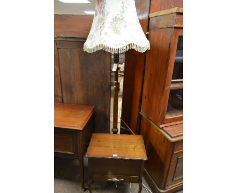 An Edwardian mahogany sewing box, the shaped hinged top enclosing a satin lined interior above a single drawer and raised on 