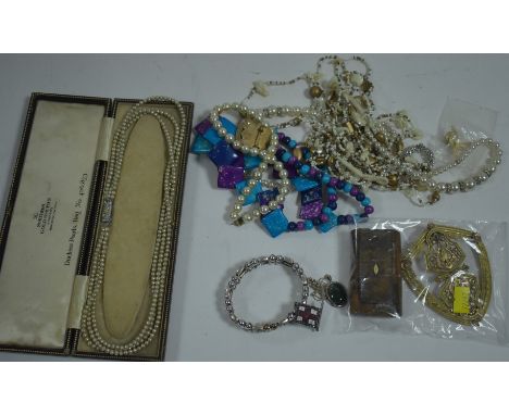 Costume jewellery, including: faux pearl necklaces; wooden snuff box; gilt metal shield; and other items.