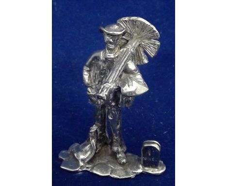 Silver Dickensian menu stand, by Thomas Charles Jarvis, London 1975, in the form of a chimney sweep.