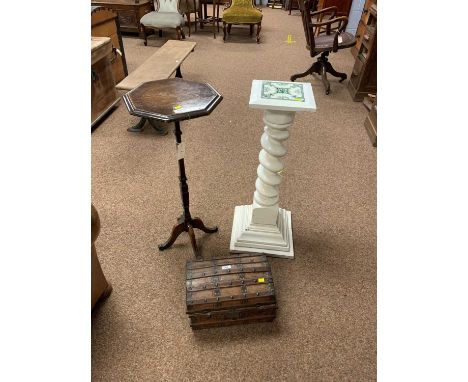 An Edwardian wine table with octagonal top on tapering square section column with quadripartite base; a small domed and bound