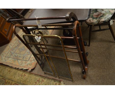 An Edwardian mahogany and inlaid towel rail with scroll supports inlaid with harebells and united with hanging bars, raised o