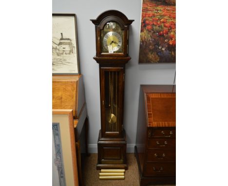 A 20th century oak Grandmother clock, the brass dial with foliate spandrels contained within hood with broken arched top, and