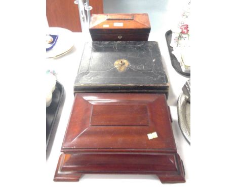 An Early 20th Century mahogany cigar box with label to underside of cover 'Made from timber removed from HMS Britannia, Cadet