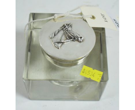 A silver covered glass inkwell, by Joseph Gloster &amp; Sons, Birmingham 1913, the cover with horses head design.