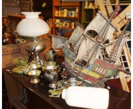 Converted oil lamp with silver-plated base and milk glass shade, and assorted silver-plate, together with a painted wooden mo