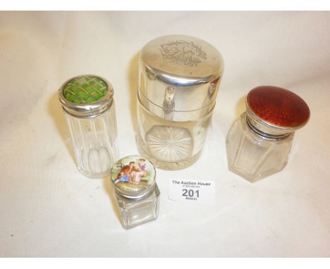 Three silver and enamel topped perfume bottles and a silver topped glass jar