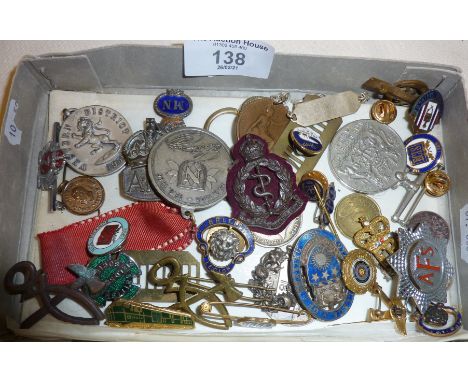 Assorted enamel badges, some military, a hallmarked silver WW2 ARP badge, coins, medal, etc.