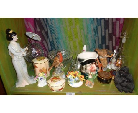 Shelf of assorted china ornaments