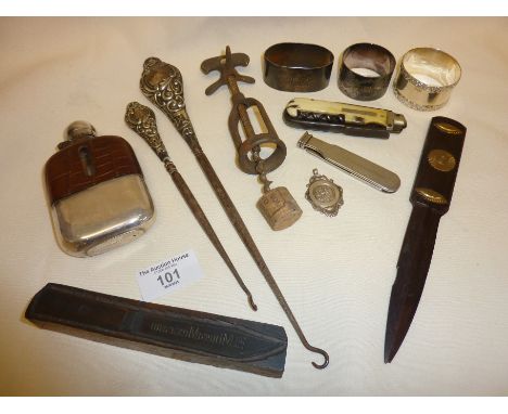 Hallmarked silver napkin rings, button hooks, fob medal, together with a corkscrew, hip flask, multitool pocket knife by Rich