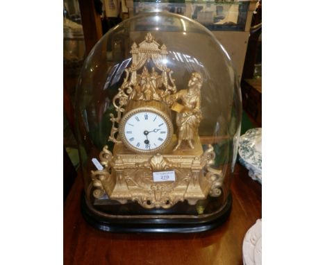 19th c. French gilt mantle clock, under dome, surmounted by figure of a girl directing a play with model theatre, 41cm tall